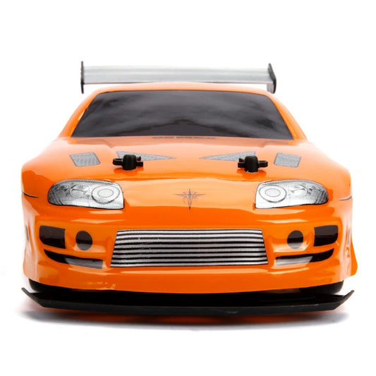 Jada 1:10 RC Brian's 1995 Toyota Supra MK4 Drift Uzaktan Kumandalı Araba | 2.4 Ghz USB Şarj 42cm 9 Km/s 4WD Fast & Furious 8+ Yaş ve Üzeri Çocuklar İçin