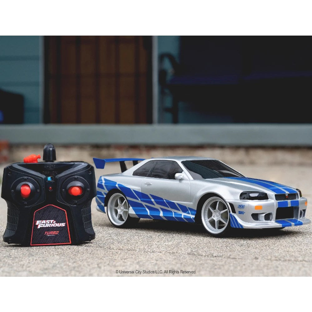 Jada 1:16 Brian's 2002 Nissan Skyline GT-R Uzaktan Kumandalı Araba | 2.4 Ghz USB Şarj 29 Cm BNR34 Turbo Modlu Fast & Furious 6+ Yaş ve Üzeri Çocuklar İçin
