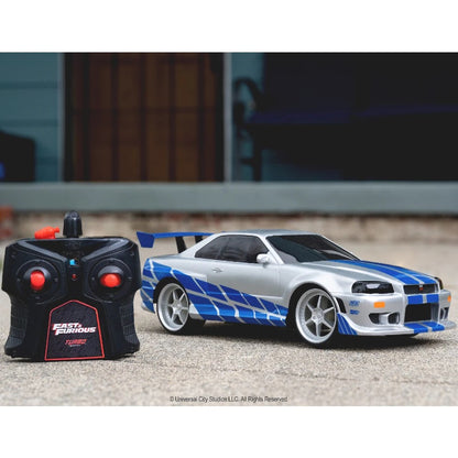 Jada 1:16 Brian's 2002 Nissan Skyline GT-R Uzaktan Kumandalı Araba | 2.4 Ghz USB Şarj 29 Cm BNR34 Turbo Modlu Fast & Furious 6+ Yaş ve Üzeri Çocuklar İçin